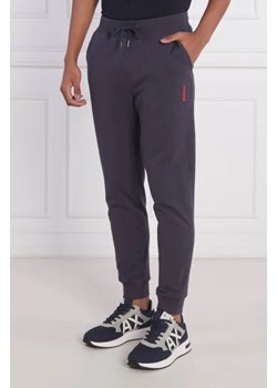 GUESS Spodnie dresowe Adam | Regular Fit ze sklepu Gomez Fashion Store w kategorii Spodnie męskie - zdjęcie 172966586