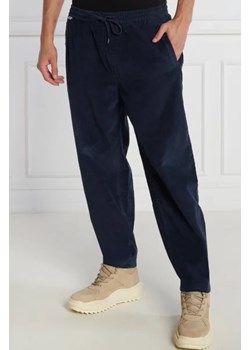 Tommy Jeans Spodnie dresowe TJM CORDUROY | Oversize fit ze sklepu Gomez Fashion Store w kategorii Spodnie męskie - zdjęcie 172986019