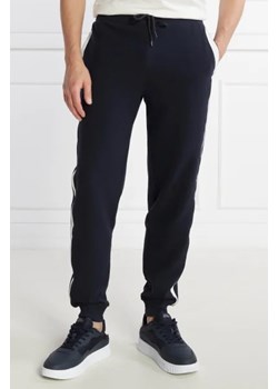 Tommy Hilfiger Spodnie dresowe | Regular Fit ze sklepu Gomez Fashion Store w kategorii Spodnie męskie - zdjęcie 172989477