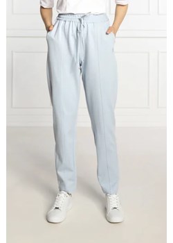 Tommy Hilfiger Spodnie dresowe | Regular Fit ze sklepu Gomez Fashion Store w kategorii Spodnie damskie - zdjęcie 172991196