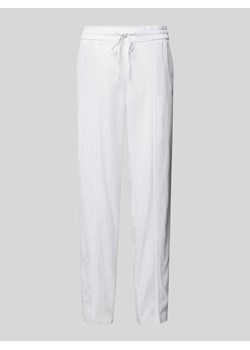 Spodnie materiałowe o kroju tapered fit z tunelem ze sklepu Peek&Cloppenburg  w kategorii Spodnie damskie - zdjęcie 173005075