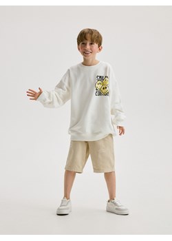 Reserved - Bluza ovesize SmileyWorld - złamana biel ze sklepu Reserved w kategorii Bluzy chłopięce - zdjęcie 173013079