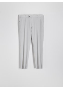 Reserved - Spodnie garniturowe slim z wełną - beżowy ze sklepu Reserved w kategorii Spodnie męskie - zdjęcie 173117379