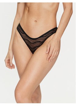 Calvin Klein Underwear Stringi 000QD3971E Czarny ze sklepu MODIVO w kategorii Majtki damskie - zdjęcie 173119947