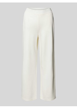 Spodnie materiałowe o rozkloszowanym kroju z elastycznym pasem ze sklepu Peek&Cloppenburg  w kategorii Spodnie damskie - zdjęcie 173124178