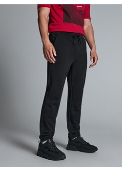 Sinsay - Spodnie dresowe - czarny ze sklepu Sinsay w kategorii Spodnie męskie - zdjęcie 173132348