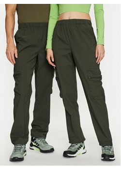 Rains Spodnie materiałowe Tomar Pants Regular 19300 Zielony Regular Fit ze sklepu MODIVO w kategorii Spodnie damskie - zdjęcie 173138808