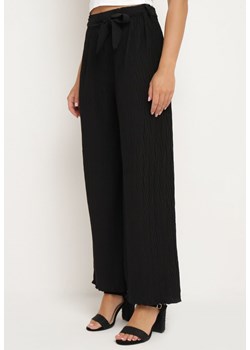Czarne Spodnie Szerokie Wiązane w Talii Ovolia ze sklepu Born2be Odzież w kategorii Spodnie damskie - zdjęcie 173285597