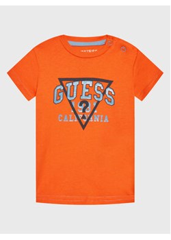 Guess T-Shirt I3RI03 K8HM0 Pomarańczowy Regular Fit ze sklepu MODIVO w kategorii T-shirty chłopięce - zdjęcie 173292495