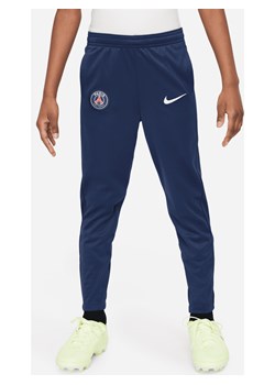 Spodnie piłkarskie z dzianiny dla małych dzieci Nike Dri-FIT Paris Saint-Germain Academy Pro - Niebieski ze sklepu Nike poland w kategorii Spodnie chłopięce - zdjęcie 173311216