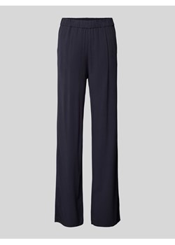 Spodnie materiałowe o rozkloszowanym kroju z elastycznym pasem model ‘CHIARA’ ze sklepu Peek&Cloppenburg  w kategorii Spodnie damskie - zdjęcie 173334839