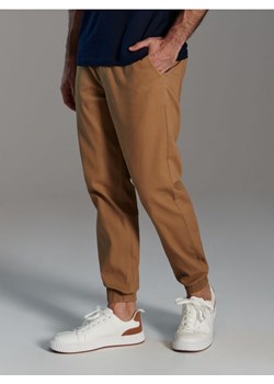 Sinsay - Spodnie jogger - beżowy ze sklepu Sinsay w kategorii Spodnie męskie - zdjęcie 173361277