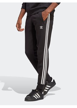 adidas Spodnie dresowe w kolorze czarnym ze sklepu Limango Polska w kategorii Spodnie męskie - zdjęcie 173362229