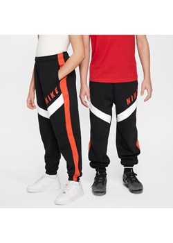 Dzianinowe joggery o kroju oversize dla dużych dzieci (dziewcząt) Nike Sportswear - Czerń ze sklepu Nike poland w kategorii Spodnie męskie - zdjęcie 173428996
