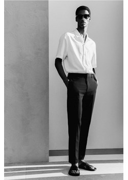 H & M - Spodnie Slim Fit - Czarny ze sklepu H&M w kategorii Spodnie męskie - zdjęcie 173445247