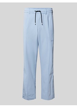 Spodnie dresowe z elastycznym pasem model ‘League’ ze sklepu Peek&Cloppenburg  w kategorii Spodnie męskie - zdjęcie 173554009