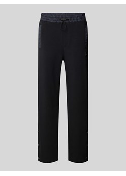 Spodnie dresowe o kroju regular fit z tunelem model ‘Dayquario’ ze sklepu Peek&Cloppenburg  w kategorii Spodnie męskie - zdjęcie 173554185