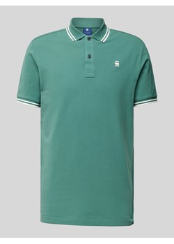Koszulka polo o kroju slim fit z przedłużonym tyłem model ‘Dunda’ ze sklepu Peek&Cloppenburg  w kategorii T-shirty męskie - zdjęcie 173554219