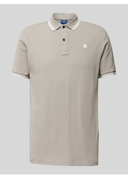 Koszulka polo o kroju slim fit z przedłużonym tyłem model ‘Dunda’ ze sklepu Peek&Cloppenburg  w kategorii T-shirty męskie - zdjęcie 173554519