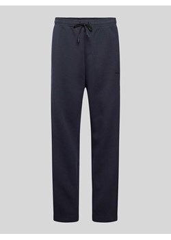 Spodnie dresowe w jednolitym kolorze model ‘Hadim’ ze sklepu Peek&Cloppenburg  w kategorii Spodnie męskie - zdjęcie 173555207