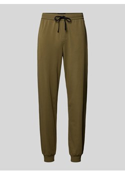Spodnie dresowe z elastycznym pasem model ‘Hadiko’ ze sklepu Peek&Cloppenburg  w kategorii Spodnie męskie - zdjęcie 173555706