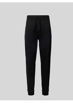 Spodnie dresowe o kroju slim fit z elastycznym pasem ze sklepu Peek&Cloppenburg  w kategorii Spodnie męskie - zdjęcie 173556008