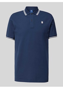 Koszulka polo o kroju slim fit z przedłużonym tyłem model ‘Dunda’ ze sklepu Peek&Cloppenburg  w kategorii T-shirty męskie - zdjęcie 173556139