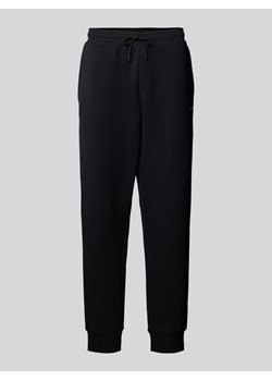 Spodnie dresowe z kieszenią z tyłu model ‘Hadiko’ ze sklepu Peek&Cloppenburg  w kategorii Spodnie męskie - zdjęcie 173578368