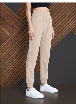 Sinsay - Spodnie dresowe - beżowy ze sklepu Sinsay w kategorii Spodnie damskie - zdjęcie 173605048