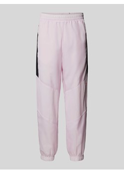 Spodnie dresowe z elastycznym ściągaczem ze sklepu Peek&Cloppenburg  w kategorii Spodnie męskie - zdjęcie 173611576