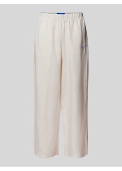 Spodnie lniane o kroju regular fit z wyhaftowanym logo ze sklepu Peek&Cloppenburg  w kategorii Spodnie męskie - zdjęcie 173618137