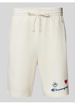 Szorty z dzianiny dresowej kroju regular fit z nadrukiem z motywem ze sklepu Peek&Cloppenburg  w kategorii Spodenki męskie - zdjęcie 173638465