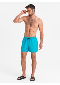 Neonowe szorty męskie kąpielowe z efektem magic print – turkusowe V2 OM-SRBS-0147 ze sklepu ombre w kategorii Kąpielówki - zdjęcie 173639317