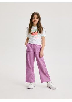 Reserved - Błyszczące spodnie - brudny róż ze sklepu Reserved w kategorii Spodnie dziewczęce - zdjęcie 173659199