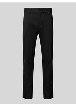 Spodnie o luźnym kroju z detalem z logo model ‘TECH’ ze sklepu Peek&Cloppenburg  w kategorii Spodnie męskie - zdjęcie 173660548