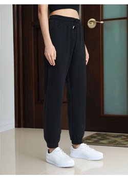 Sinsay - Spodnie dresowe bawełniane - czarny ze sklepu Sinsay w kategorii Spodnie damskie - zdjęcie 173682975