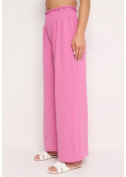 Różowe Szerokie Spodnie z Wysokim Stanem Wykończone Gumką w Pasie Risinassa ze sklepu Born2be Odzież w kategorii Spodnie damskie - zdjęcie 173683397