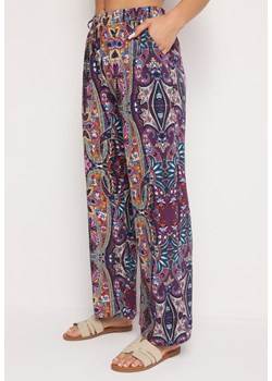 Fioletowe Szerokie Wiskozowe Spodnie w Kwiaty z Wysokim Stanem i Gumką w Talii Izorea ze sklepu Born2be Odzież w kategorii Spodnie damskie - zdjęcie 173684156