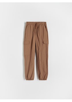 Reserved - Spodnie parachute z łączonych materiałów - brązowy ze sklepu Reserved w kategorii Spodnie chłopięce - zdjęcie 173708639