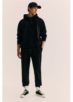 H & M - Spodnie dresowe Regular Fit - Czarny ze sklepu H&M w kategorii Spodnie męskie - zdjęcie 173722257