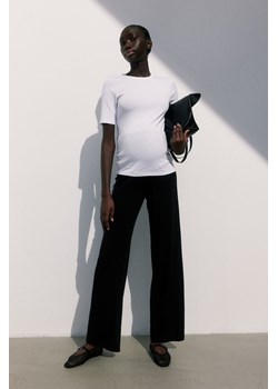 H & M - MAMA Dżersejowe spodnie Before & After - Czarny ze sklepu H&M w kategorii Spodnie ciążowe - zdjęcie 173739296