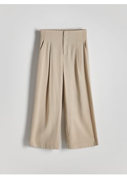 Reserved - Spodnie z wiskozy - beżowy ze sklepu Reserved w kategorii Spodnie damskie - zdjęcie 173748537