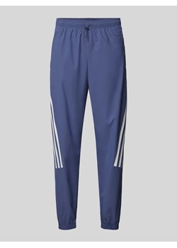 Spodnie dresowe z tunelem ze sklepu Peek&Cloppenburg  w kategorii Spodnie męskie - zdjęcie 173750877