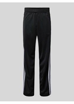 Spodnie treningowe o kroju regular fit z kieszeniami zapinanymi na zamek błyskawiczny ze sklepu Peek&Cloppenburg  w kategorii Spodnie męskie - zdjęcie 173789729