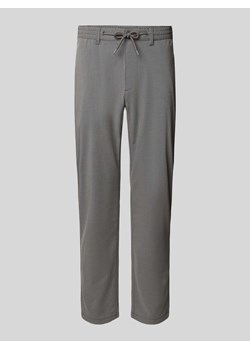 Spodnie materiałowe o kroju tapered fit z tunelem ze sklepu Peek&Cloppenburg  w kategorii Spodnie męskie - zdjęcie 173796158