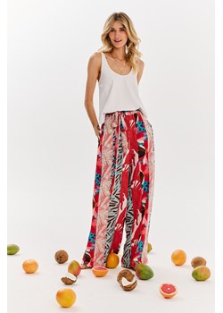 Szerokie spodnie Floral Frenzy XS/S ze sklepu NAOKO w kategorii Spodnie damskie - zdjęcie 173808026