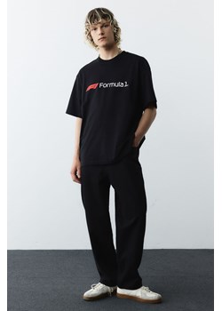 H & M - T-shirt Loose Fit - Czarny ze sklepu H&M w kategorii Bluzki damskie - zdjęcie 173827367