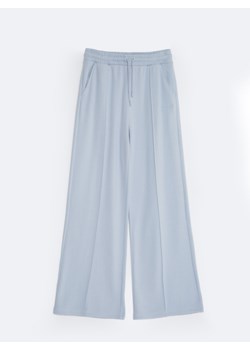 Spodnie damskie dresowe z szeroką nogawką błękitne Chitasanap 401/ Chitasana 401 ze sklepu Big Star w kategorii Spodnie damskie - zdjęcie 173830858