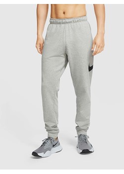 Nike Spodnie dresowe w kolorze szarym ze sklepu Limango Polska w kategorii Spodnie męskie - zdjęcie 173857667