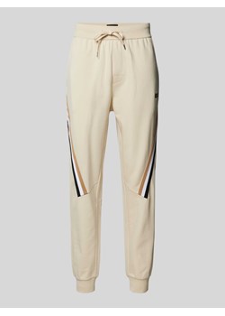 Spodnie dresowe z elastycznym pasem model ‘Iconic’ ze sklepu Peek&Cloppenburg  w kategorii Spodnie męskie - zdjęcie 173872369